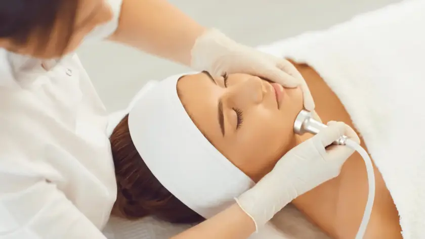 A client receiving an advanced cosmetic facial skin rejuvenation treatment at Xthetics Med Spa.
